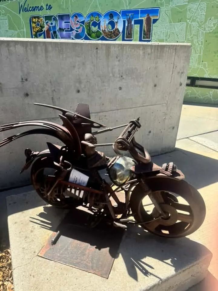 Hunt B: package at the motorcycle sculpture
